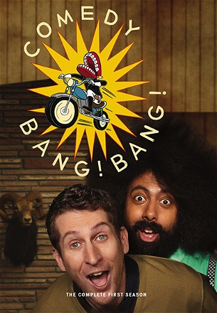 Zach Galifianakis Wears a Blue Jacket & Red Socks